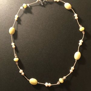 Delicate green and white necklace.